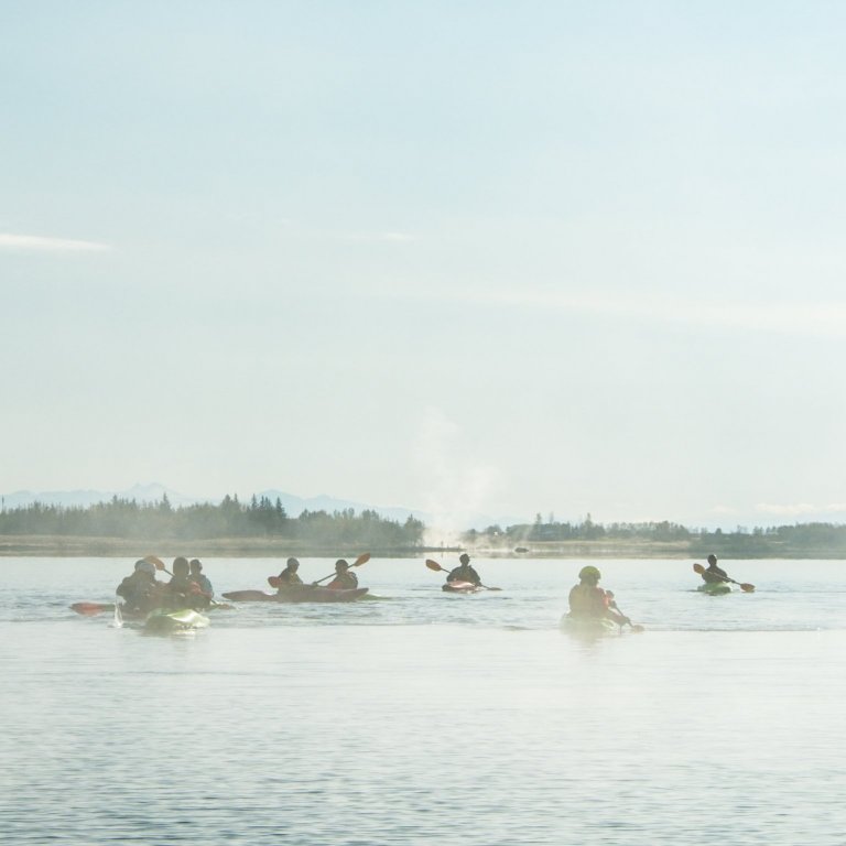 Kayaking at Lake Laugarvatn in 2019 with geothermal pools in the background